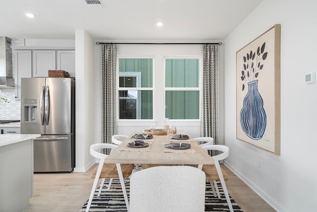 dining area featuring light hardwood / wood-style flooring