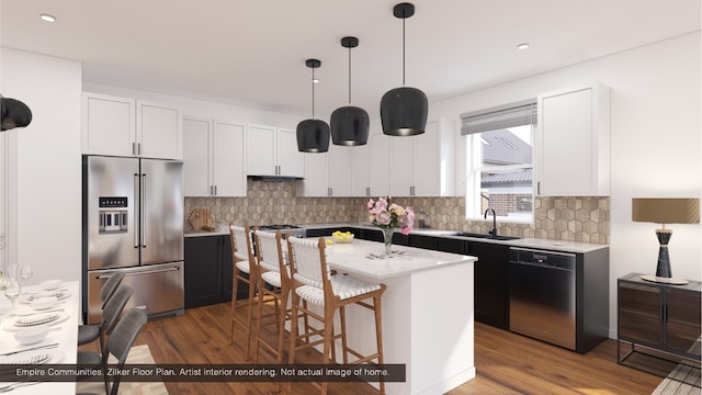 kitchen featuring a breakfast bar, dishwashing machine, white cabinets, high end fridge, and a sink