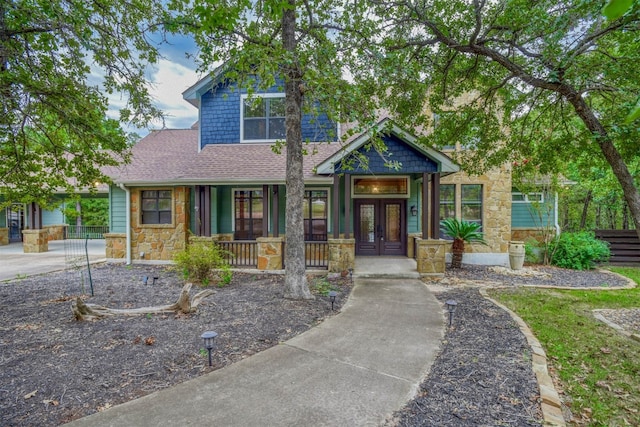 craftsman-style home with covered porch