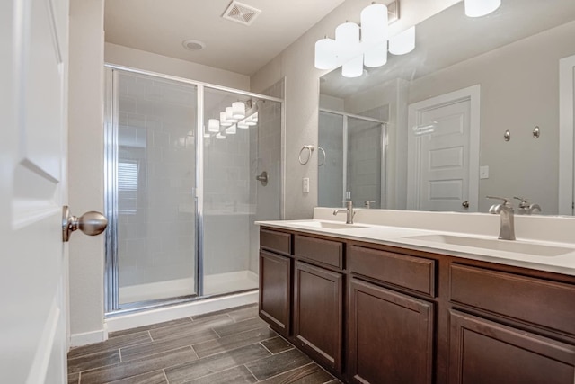 bathroom featuring vanity and walk in shower