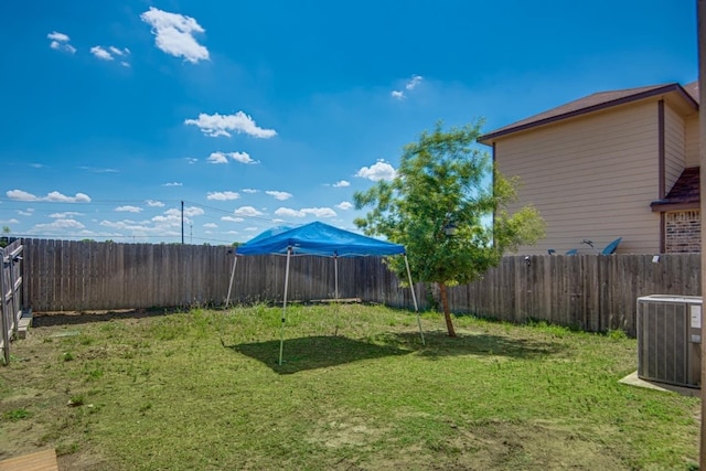 view of yard with central AC