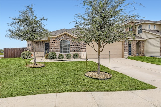 view of front facade with a garage and a front lawn