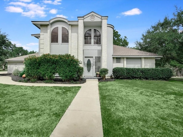 view of front of property with a front lawn