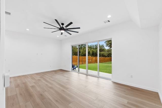 unfurnished room with light hardwood / wood-style flooring and ceiling fan