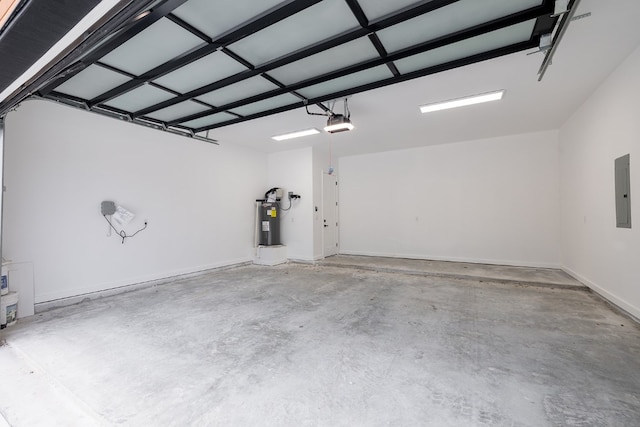 garage featuring a garage door opener, electric panel, and electric water heater