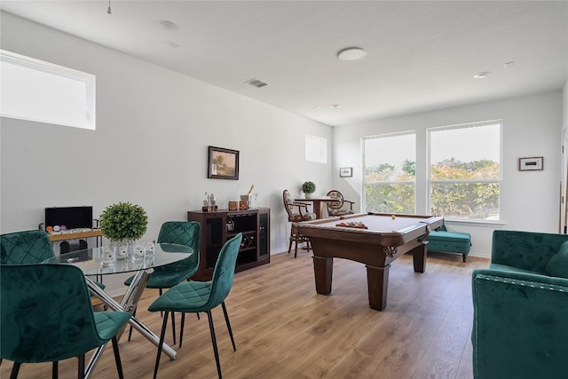 recreation room with hardwood / wood-style flooring and billiards