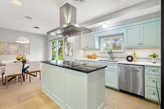 kitchen featuring a center island, sink, stainless steel dishwasher, decorative light fixtures, and island exhaust hood