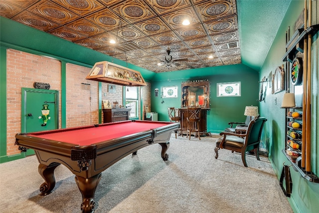 rec room with pool table, indoor bar, lofted ceiling, carpet floors, and ceiling fan