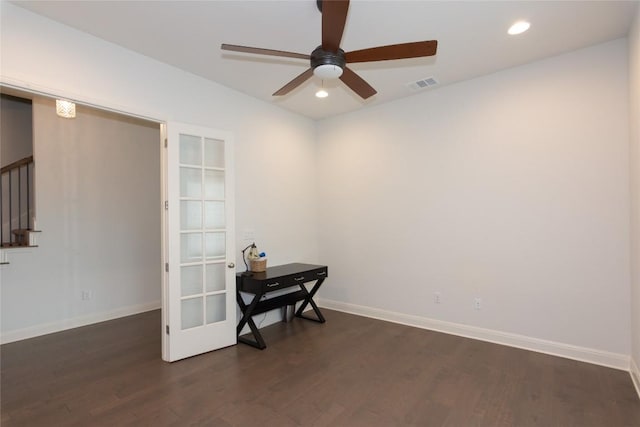 19108 Excursion Falls Way, Jonestown, TX 78645 - empty room with baseboards, ceiling fan, visible vents, stairs, and dark wood-type flooring