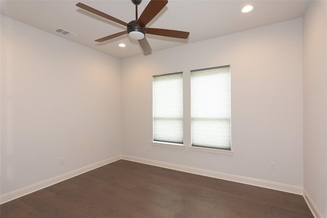 19108 Excursion Falls Way, Jonestown, TX 78645 - spare room with visible vents, recessed lighting, dark wood-style floors, a ceiling fan, and baseboards