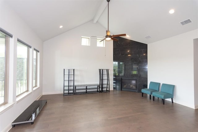 19108 Excursion Falls Way, Jonestown, TX 78645 - living room with wood finished floors, high vaulted ceiling, visible vents, ceiling fan, and beamed ceiling