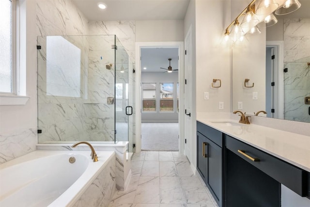 bathroom with vanity, ceiling fan, and independent shower and bath