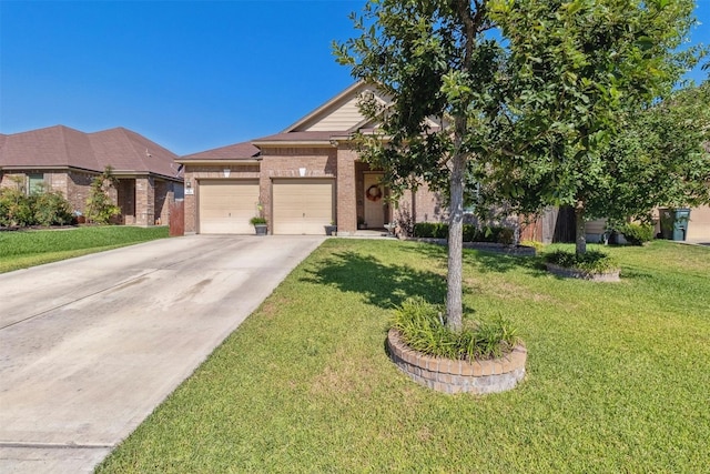 view of front of house with a garage and a front yard