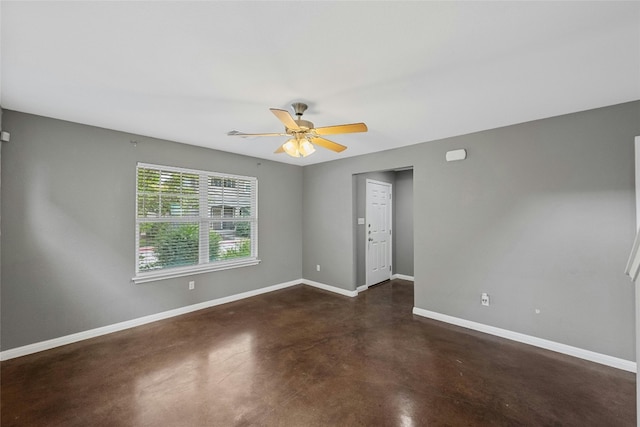 empty room featuring ceiling fan