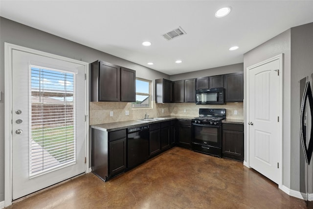 kitchen with black appliances, sink, dark brown cabinets, and tasteful backsplash