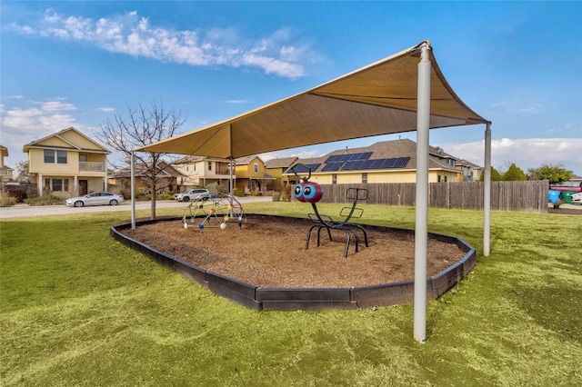 view of playground featuring a lawn