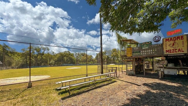 view of property's community featuring a lawn