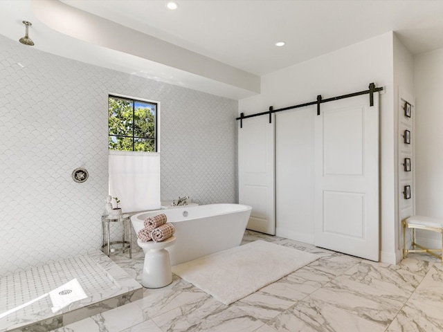 bathroom featuring separate shower and tub