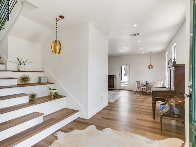 stairway with wood-type flooring