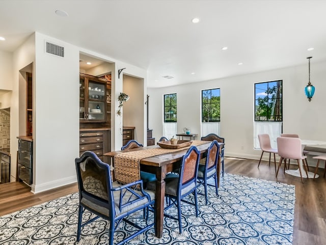 dining room featuring hardwood / wood-style flooring