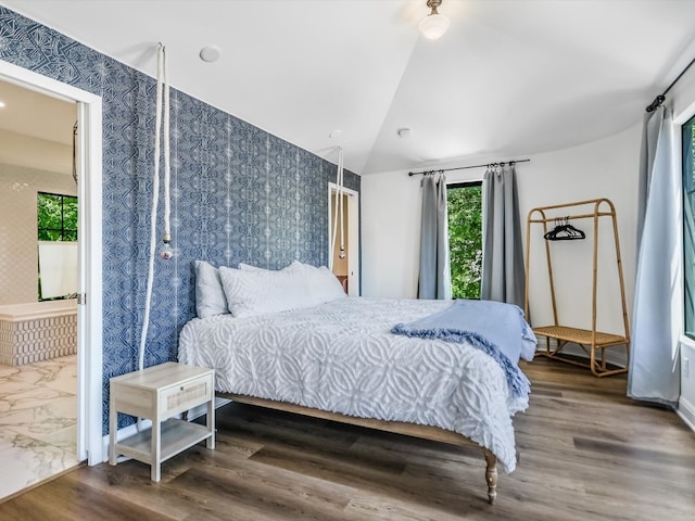 bedroom featuring dark hardwood / wood-style flooring