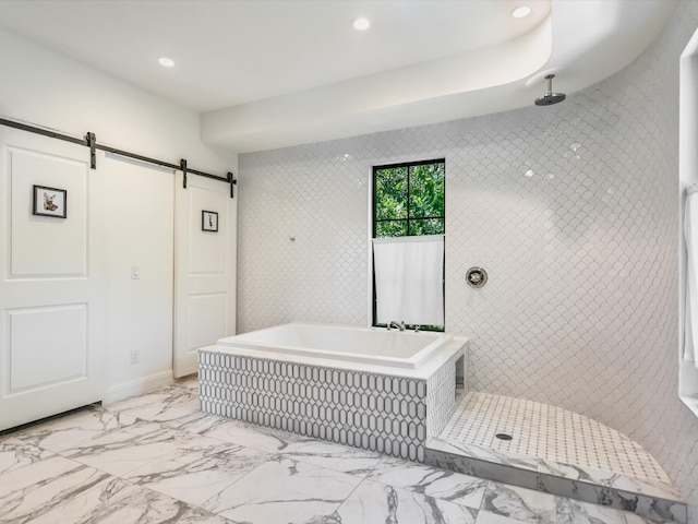 bathroom featuring plus walk in shower