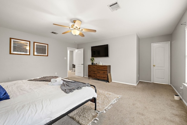 carpeted bedroom with ceiling fan