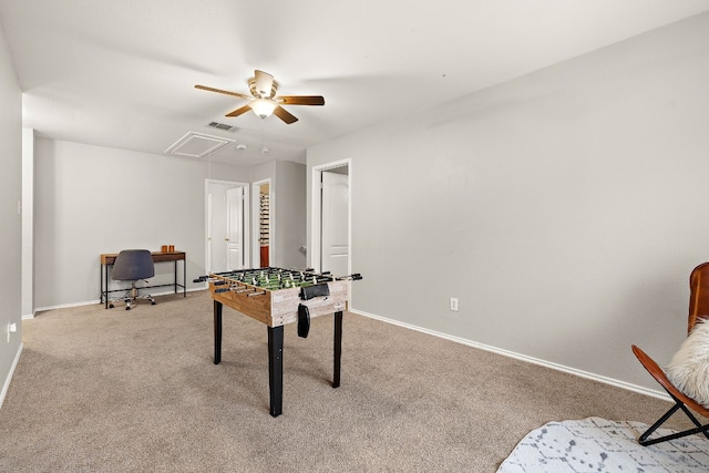 playroom featuring light colored carpet and ceiling fan