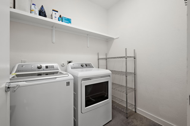 washroom with washer and clothes dryer