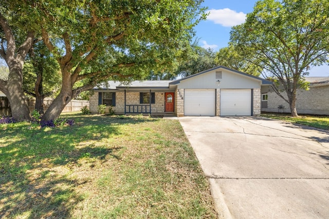 view of front facade featuring a garage and a front yard