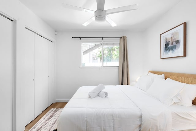 bedroom featuring ceiling fan and light wood-type flooring