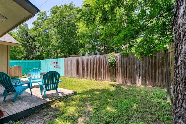 view of yard with a wooden deck