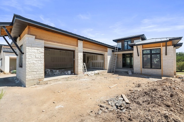 view of front of home featuring a garage