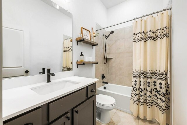 full bathroom with tile patterned flooring, vanity, shower / bath combination with curtain, and toilet