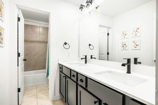 7828 Pace Ravine Dr, Lago Vista, TX 78645 - bathroom featuring tile patterned flooring, vanity, and shower / bath combination with curtain