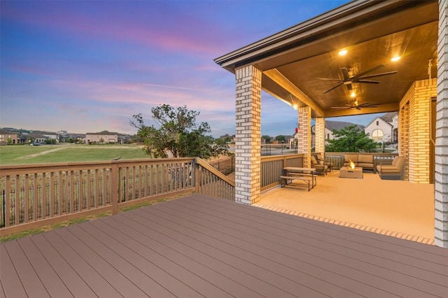 7828 Pace Ravine Dr, Lago Vista, TX 78645 - deck at dusk featuring outdoor lounge area and ceiling fan