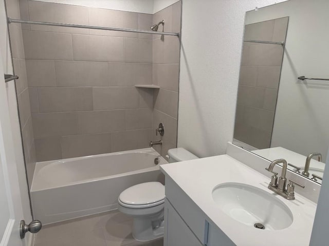 full bathroom with tiled shower / bath combo, vanity, and toilet