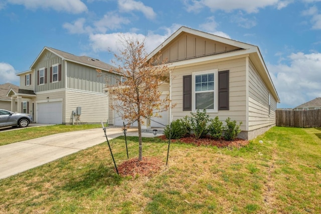 14601 Shooter Mc Gavin Dr, Manor, TX 78653 - view of front facade featuring board and batten siding, concrete driveway, and a garage