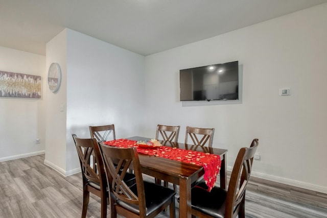 14601 Shooter Mc Gavin Dr, Manor, TX 78653 - dining space with light wood-style floors and baseboards