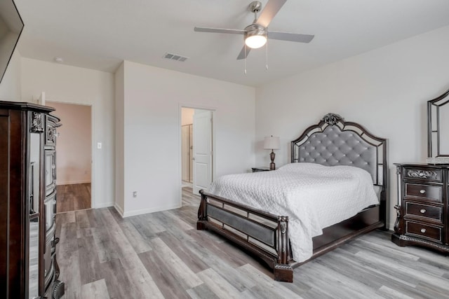 14601 Shooter Mc Gavin Dr, Manor, TX 78653 - bedroom with light wood-style floors and a ceiling fan
