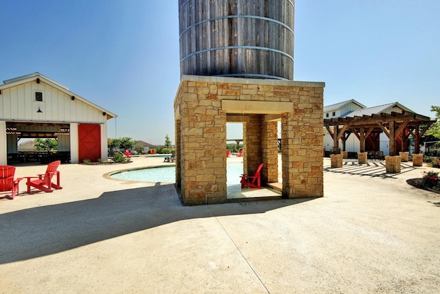 view of patio / terrace featuring a pergola and a gazebo