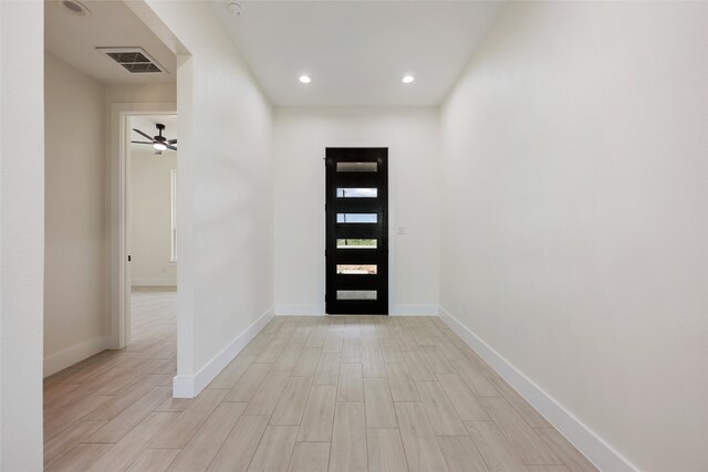 entryway with ceiling fan