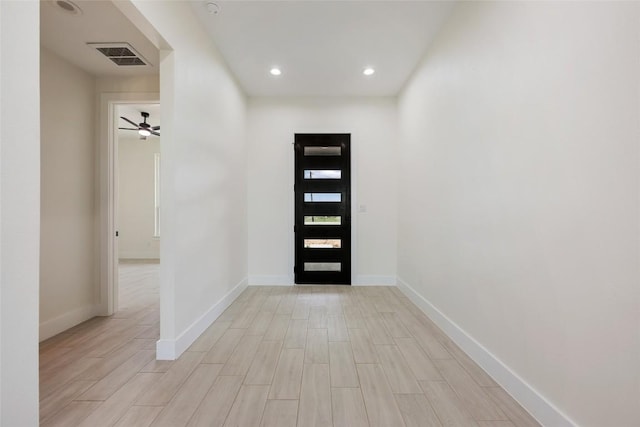 entrance foyer featuring light wood finished floors, baseboards, visible vents, recessed lighting, and a ceiling fan
