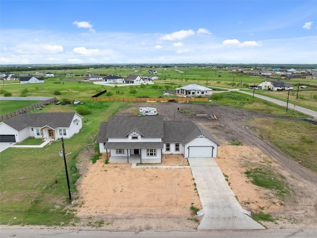 bird's eye view with a rural view