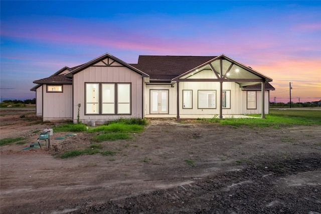 exterior space with a shingled roof