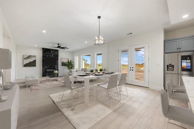 dining space featuring recessed lighting, light wood-type flooring, ceiling fan, and french doors