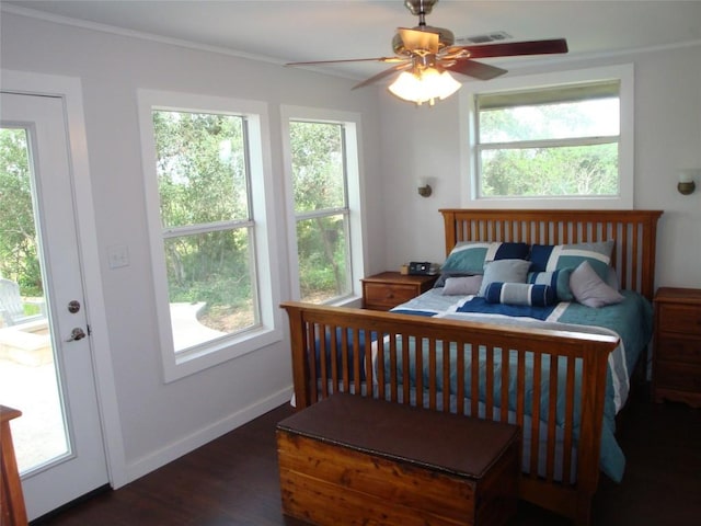 1619 Althaus Ranch Rd, Johnson City, TX 78636 - bedroom featuring multiple windows, dark wood-type flooring, ornamental molding, baseboards, and a ceiling fan