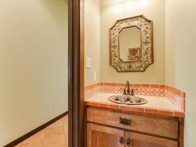 bathroom with vanity and tile patterned floors