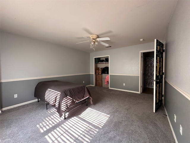 unfurnished bedroom with carpet flooring, ceiling fan, and a closet