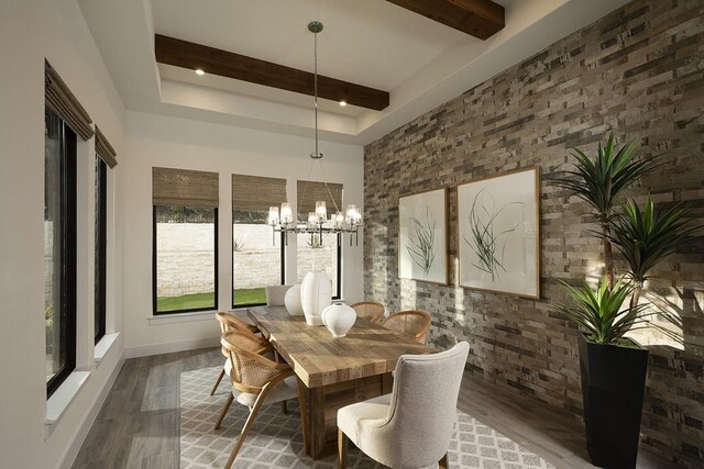 dining area with beamed ceiling, a chandelier, and hardwood / wood-style flooring